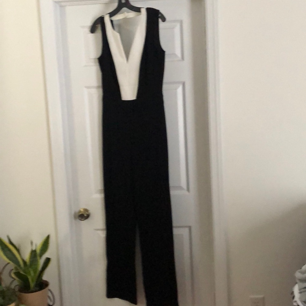 BCBG - Black and white open back jumpsuit - size 4